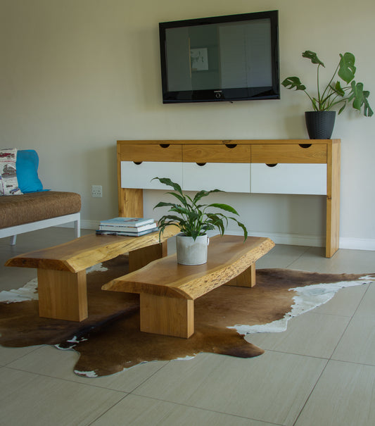 A handmade solid wood coffee table with a modern and stylish design.