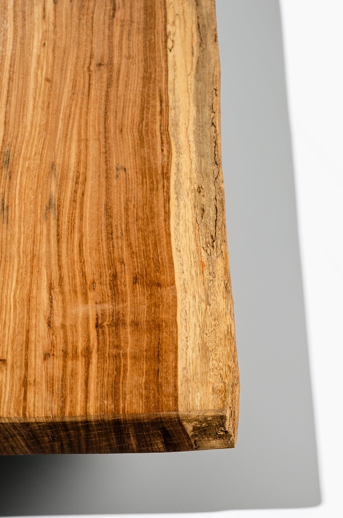 Beli single-trunk dining table with steel X-base, handcrafted by NAKA Furniture in Paarl (2 of 7)